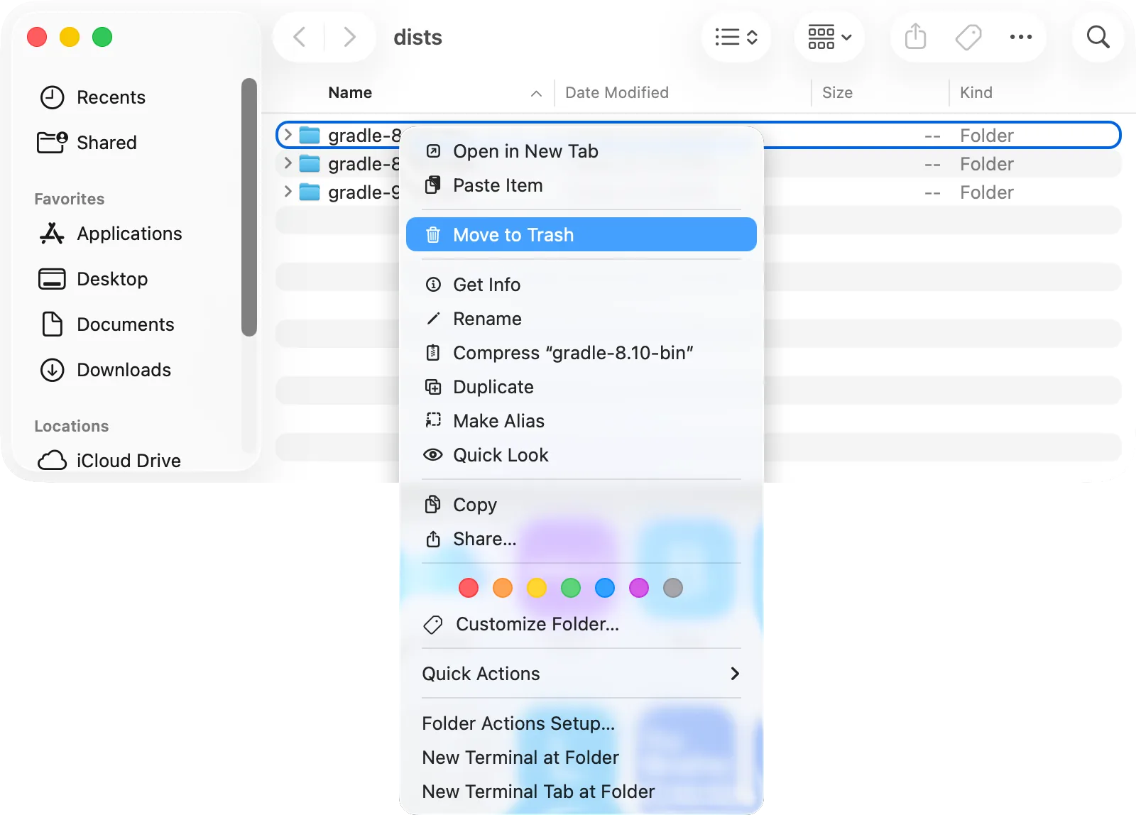 Finder, ~/.gradle/wrapper/dists: one folder per Gradle version, the oldest with «Move to Trash»