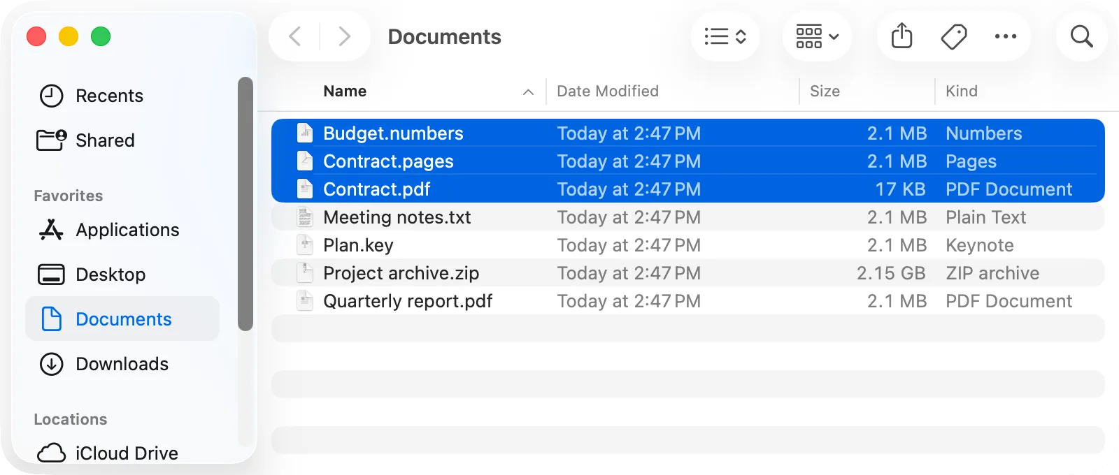 Finder in list view: three files in a row selected with Shift