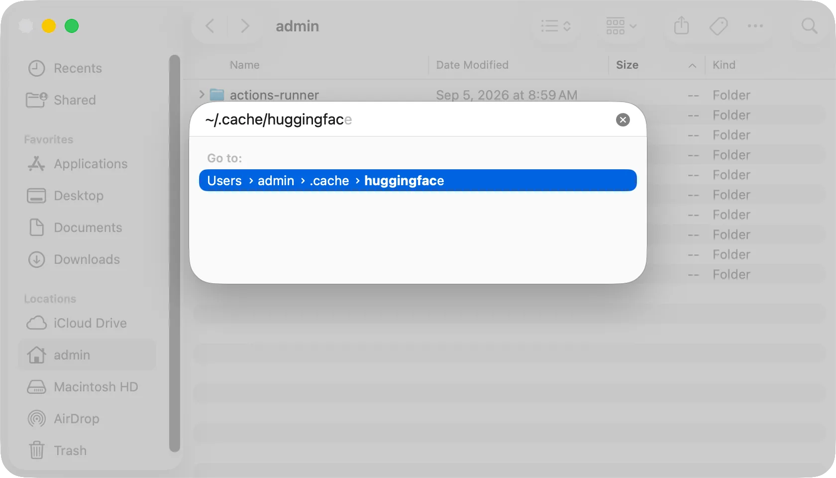 The Go to Folder panel with ~/.cache/huggingface typed