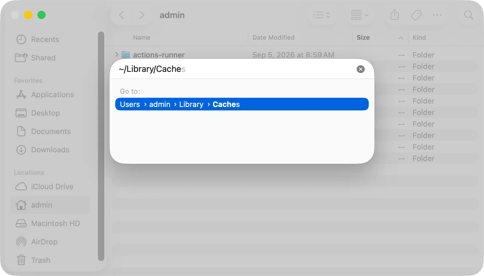 The Go to Folder panel with ~/Library/Caches typed