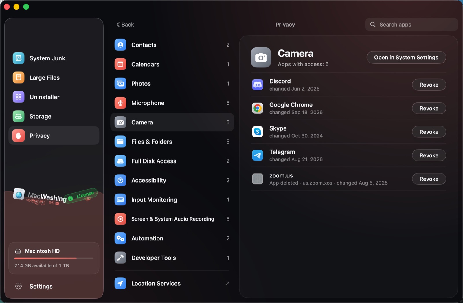 Privacy: permission categories with the number of apps in each, Camera selected with five apps and a Revoke button for each